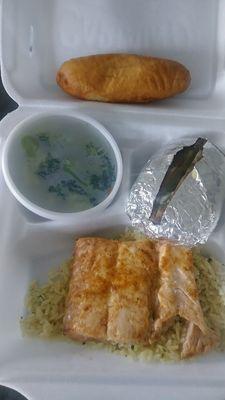 Salmon Dinner with Seasoned Rice, Steamed Broccoli, Baked Potato and a Bread Stick