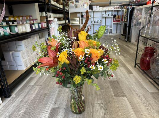 Custom arrangement with red, orange, yellow