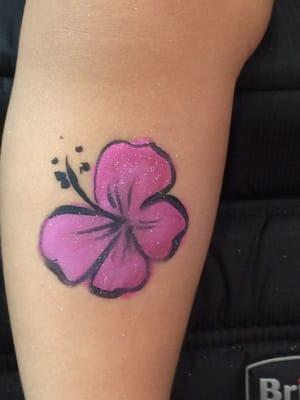 The lady painted this on my daughters leg! So quick and so cool :)