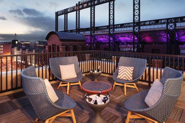 Rooftop deck with premium views of Coors Field