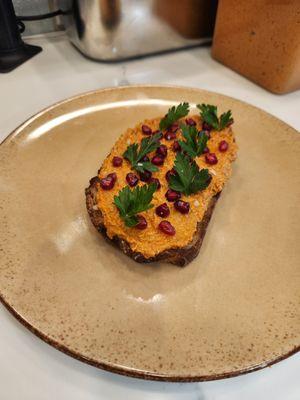 Muhammara toast (vegan roasted pepper and walnut spread) on sourdough