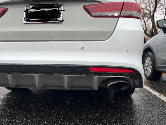 Right exhaust is crooked.