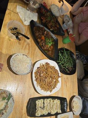 Dumplings, braised beef, green beans, beef fried noodles