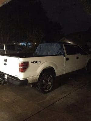 This is a picture of my truck covered with a tarp because of the water leak that Daisy wouldn't repair and didn't tell me about.