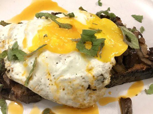 Mushroom toast with egg and chili oil