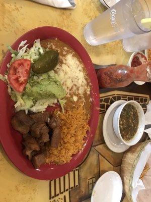 Lunch portion Carnitas plate. Soooo good. With the special request SPICY house salsa. Yummmmmy