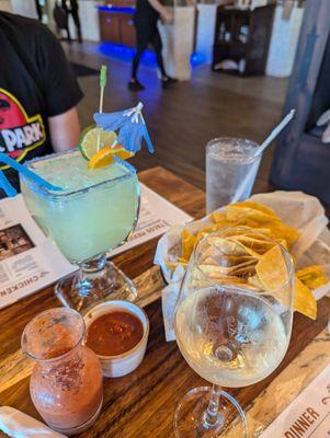 House margarita, wine, salsa and chips.