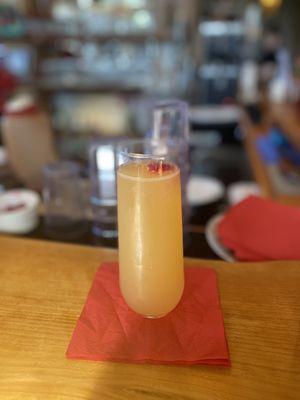 Grapefruit mimosa . The raspberry is a nice touch!