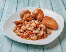 Breakfast - Saltfish with broad bean, fried bammy, fried dumpling and plantain.