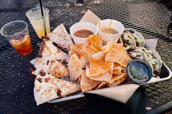 Steak tacos, chicken quesadillas, old fashioned, whiskey sour, queso, salsa, queso, badassness