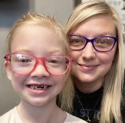 Zoey's new glasses, and my new readers. She picked out both.