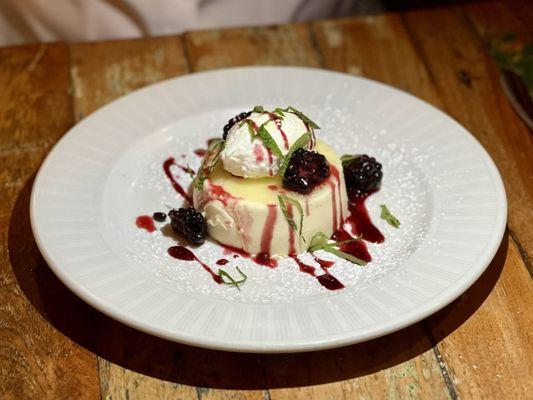 Passionfruit panna cotta with blackberries