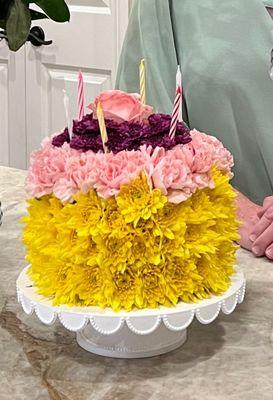 Standard birthday "cake" florals but with colors requested over the phone based on what color options they had