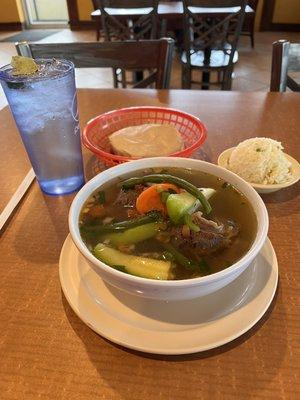 Best lunch ever! Beef soup with veggies, rice and tortillas.