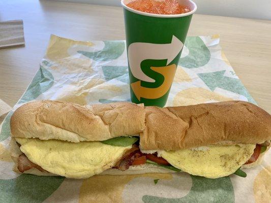 Footlong Bacon, Egg & Cheese on Italian bread with small Fanta orange.