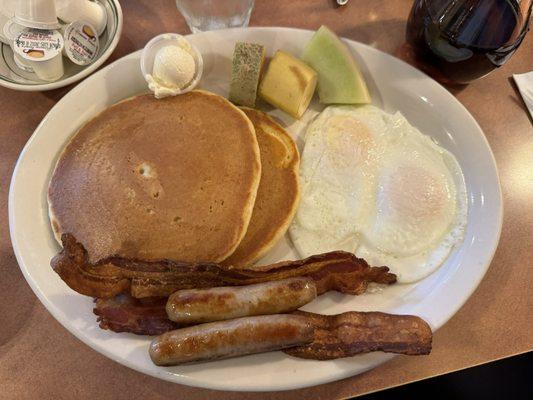 Pancake breakfast with crispy bacon