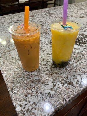 Thai tea and blended mango with boba.