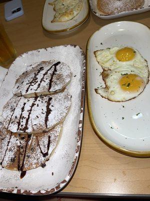 Chocolate chip pancakes with fried egg on the side