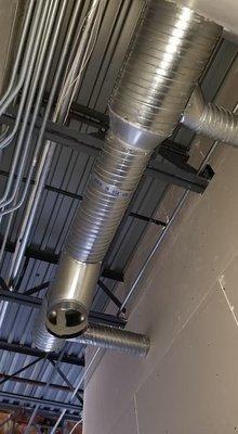 Exposed spiral pipe ductwork