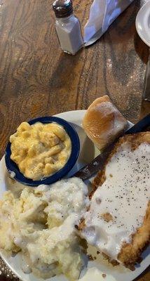 Chicken Fried Chicken, macaroni and cheese, mashed potatoes, and dinner roll