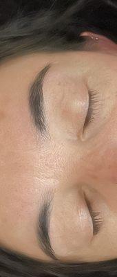 Eyebrow threading ($12)