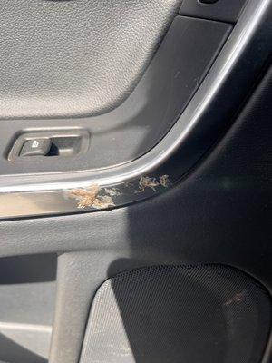 Some type of stick gunk on the inside door that was not there before I took my car here.