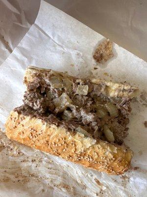 Cheesesteak w/ cooper sharp & fries onions).