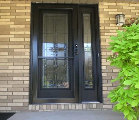 Insulated fiberglass door unit with extruded aluminum storm door.