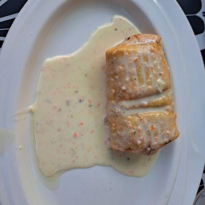 (Shredded) chicken chimichanga covered in queso,  a la carte