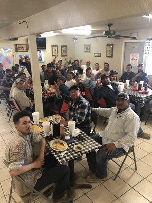 Customers enjoying their burgers and fries. We have a full kitchen to serve up your favorite dish.