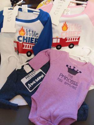 Here we have some awesome t-shirts and onesies stop by and see what we have or place a special order.