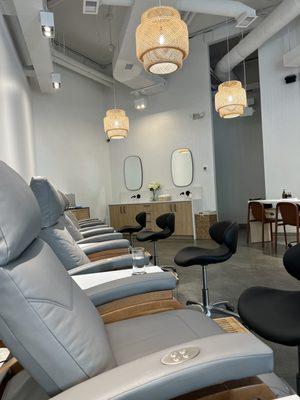 Comfy chairs for pedicure in a clean and relaxing space.