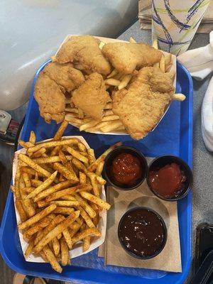 Cajun fries, chicken tenders and plain fries