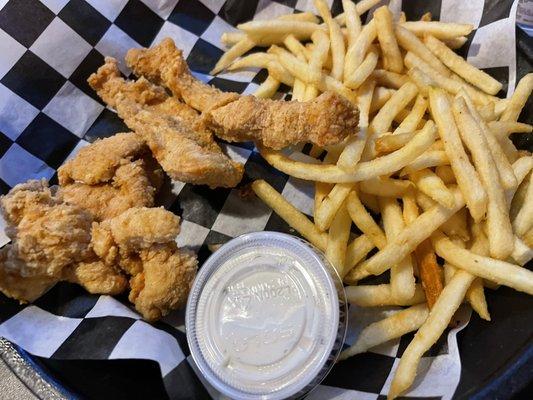 Hand battered chicken tenders with fries