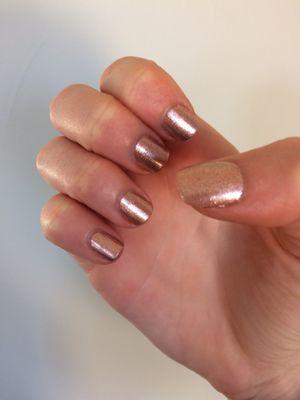 Sparkly rose gold nails! Nice atmosphere with soothing massaging chairs.