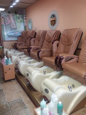 Pedicure chairs with back massage.