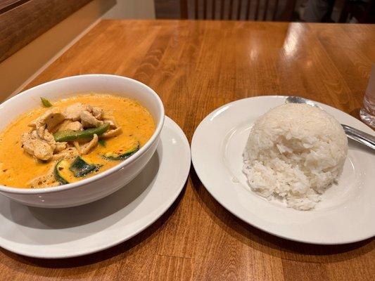 Red curry with white rice.