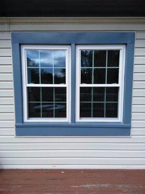 White windows with blue capping.