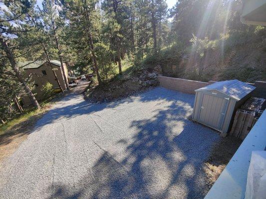 Matt built a new retaining wall for us and applied road base and gravel to improve our driveway.