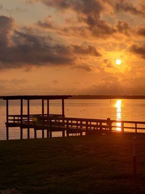 Sunrise over one of three available fishing poers on the main lake. License required.