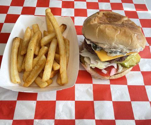 Gut Punch Burger, it's topped with Cream Cheese, Bacon and Jalapeños!!