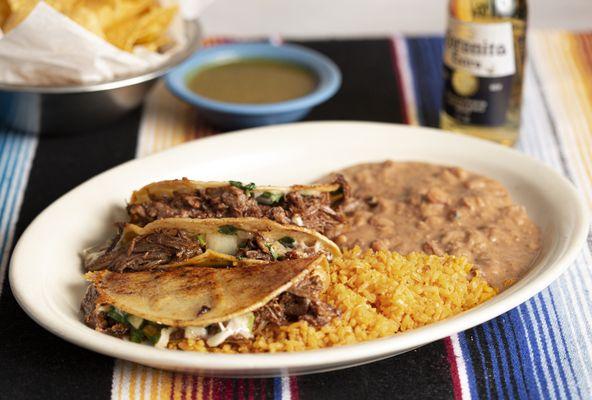 Birria Taco Dinner - 3 tacos with birria, on corn tortillas with onions & cilantro inside