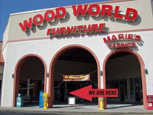 We are INSIDE "A Mini Mall" in the OLD Wood World Store, next door to Big Lots