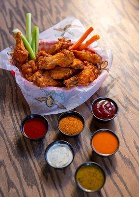 Boneless and bone-in wings with a variety of sauces.