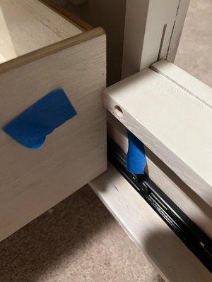 Drawer won't close- hits the side rail.