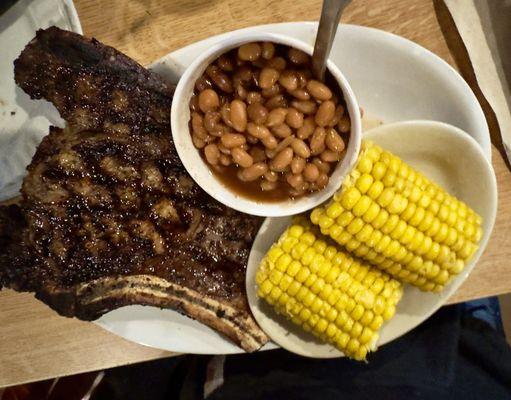 Cowboy ribeye!  Bbq beans great too!  Perfect sear on steak