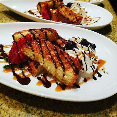 Pan seared pound cake with berries, bourbon caramel, dark chocolate, and Orange marmalade whipped cream