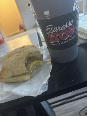 Sausage melt breakfast sandwich and latte