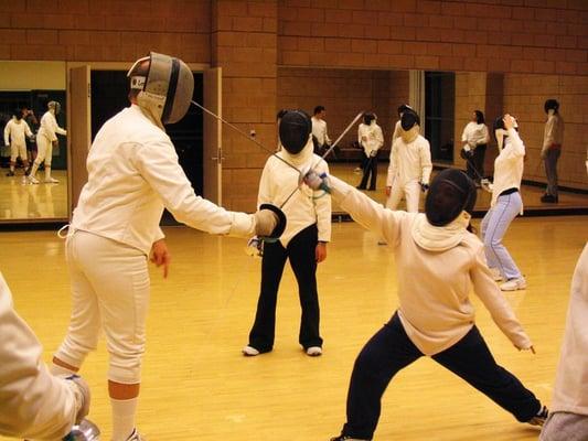 Take one of our many sports classes, including Fencing!