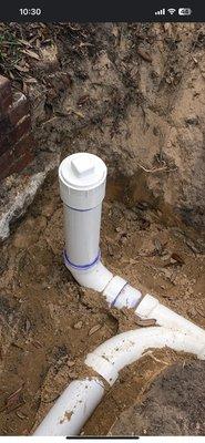 Repaired collapsed pipe with a new clean out